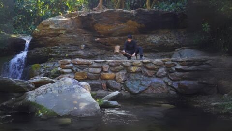 Build a house next to waterfall. Build solid foundation for your house using Primitive skills